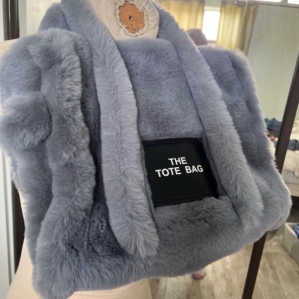 Brand: The Tote Bag. Gray faux fur